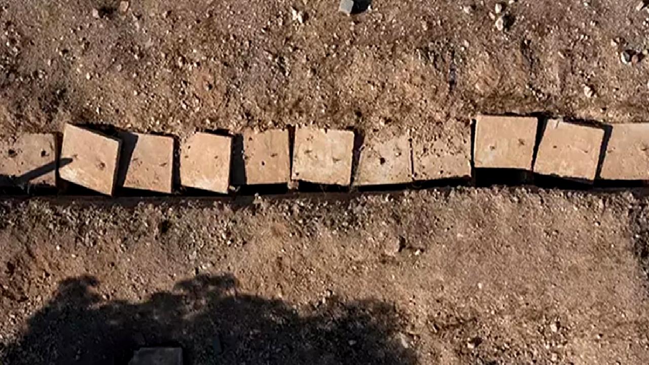 Suriye'nin Hola bölgesinde yeni bir toplu mezar tespit edildi. Bu