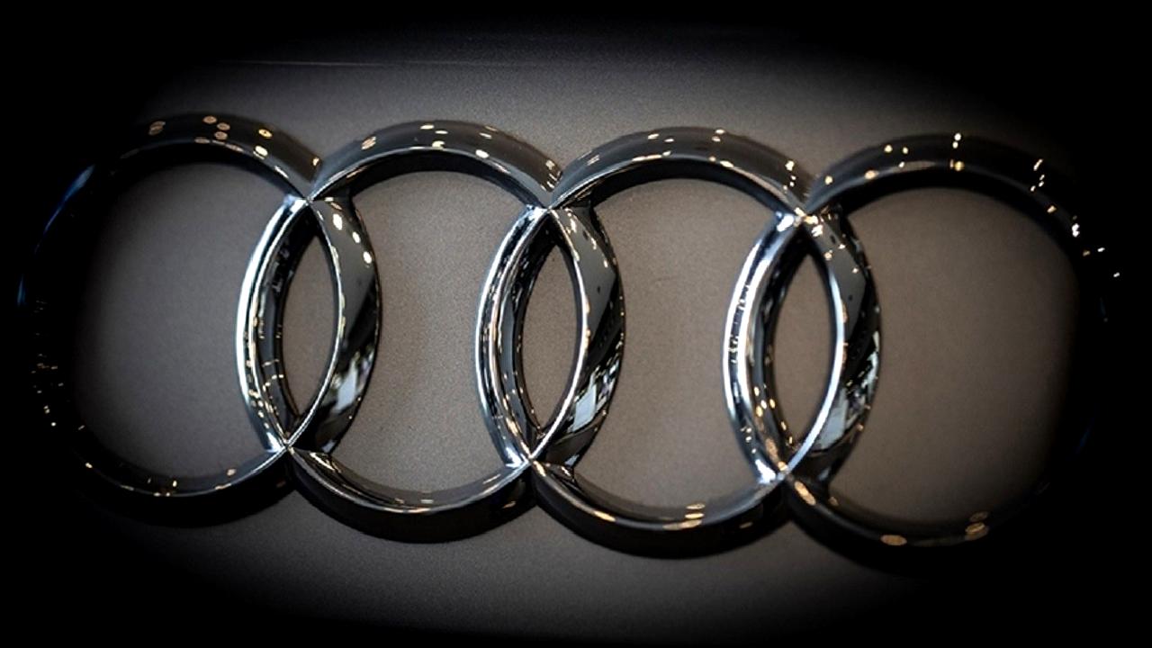 Audi, ABD pazarında araç teslimatlarını askıya alarak dikkatleri üzerine çekti.