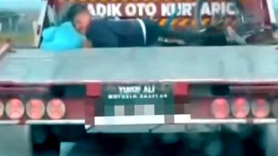 Kapaklı'da çocukla çekicide yolculuk yapan sürücüye ceza kesildi. Güvenli sürüşün