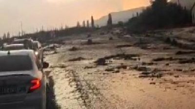 Kağızman'da etkili sağanak yağışın yol açtığı sel ve ulaşım sorunlarını